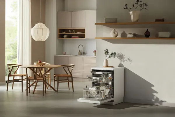 Miele G7130 SC Freestanding Full Size Dishwasher with AutoDos in White_room view open door