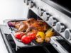 Rangemaster 15834 Edge Deluxe 110cm Induction Range Cooker in Black Glass with Chrome Trim - EDDLB110EIGBLK/CM1_grill