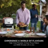 Ninja OO101UKCOVKIT Ninja Woodfire Outdoor Oven with Grill Cover & Woodfire Pellets - Terracotta/Steel_a world of flavours