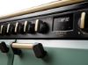 Rangemaster 18366 Classic Deluxe BC 110 Dual Fuel Range Cooker with Slow Cook Oven in Mineral Green with Antique Brass Trim - CLDLB110DFPMGR/AB1_fascia