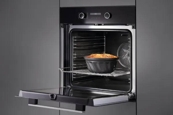 Miele H 2465 BP 59.5cm Built In Electric Single Oven - Black & Stainless Steel_in use